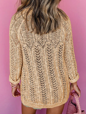 Tan openwork chevron knit cardigan with long sleeves and a relaxed fit.