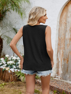 Black perforated keyhole tank top with a relaxed fit, styled with denim shorts.