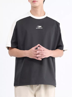 Men's contrast stitch t-shirt in dark gray with white sleeves and logo detail.