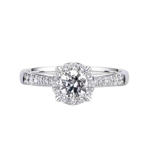 Sterling silver ring with a round brilliant moissanite center stone and halo, 1ct.