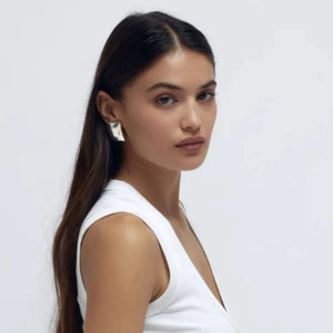 Sculpted silver rectangle earrings with a modern, minimalist design.