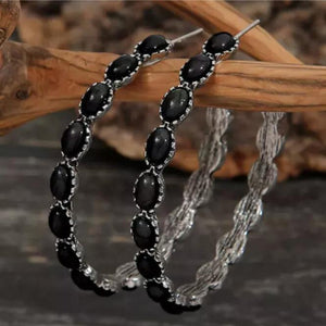 Textured black stone hoop earrings with silver alloy setting and twisted detail