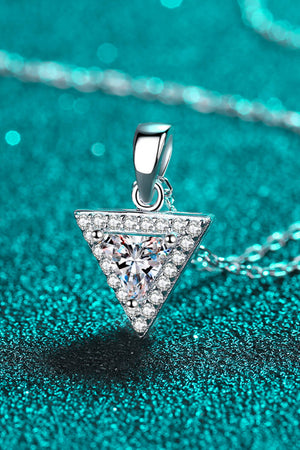 Silver geometric halo moissanite necklace with triangle pendant and pave stones.