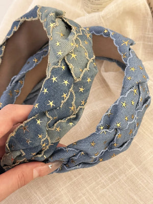 Braided denim headband with gold stars and scalloped trim.