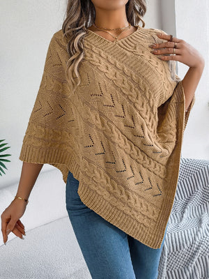 Camel cable knit poncho with chevron detail and V-neck.