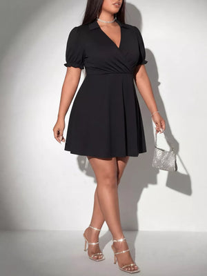 Black plus-size surplice mini dress with puff sleeves and a collared neckline.