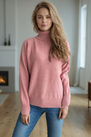 Blush pink speckled Donegal turtleneck sweater with ribbed cuffs and hem