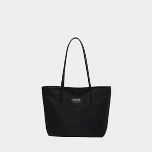 Black Oxford cloth tote bag with dual straps and a small logo detail.