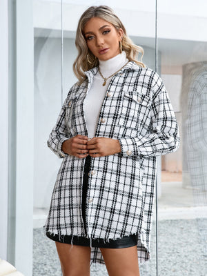 Textured plaid shacket in white with raw hem and buttoned front.