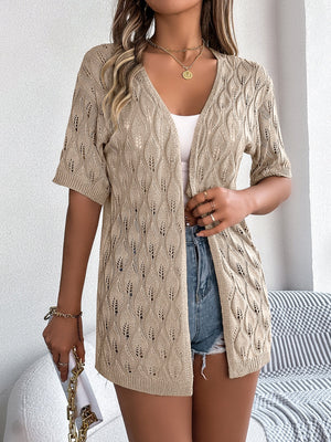 Tan open-knit short sleeve cardigan with leaf motif and V-neck.