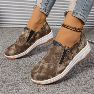 Brown tie-dye casual slip-on sneakers with side zipper and chunky sole.