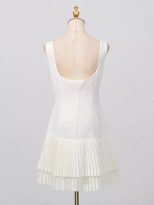 White mini dress with square neck and pleated tiered hem