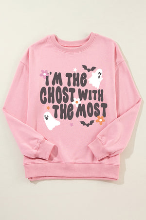 Blush pink crewneck sweatshirt with a spooky ghost and bat graphic and text that reads "I'm the ghost with the most.