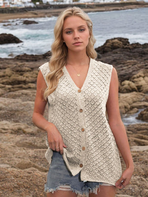 Beige openwork button-down knit vest with V-neck and wooden buttons.
