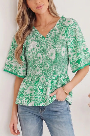 Green floral smocked v-neck polyester overshirt with ruffled sleeves