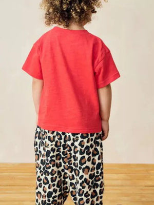 Toddler red cotton t-shirt with leopard print pants.