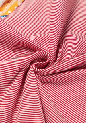 Patchwork stripe raglan tee in deep red and white thin stripes.