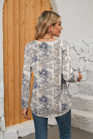 Long sleeve blouse with geometric tile print in beige and blue, featuring a gathered square neck.