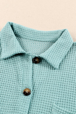 Light Green waffle knit button-down shirt jacket with brown buttons and collar detail.