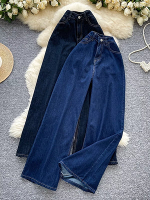 Maternity wide leg jeans in medium and dark denim with high rise and flared hems.