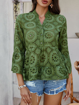 Moss green eyelet embroidered peplum blouse with ruffles and bell sleeves.