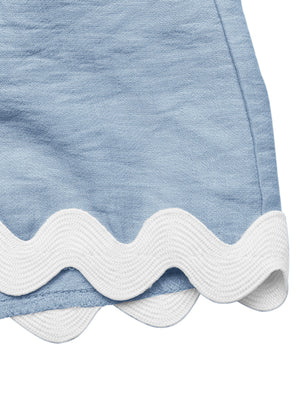 Blue maternity romper cover-up with white scalloped trim detail.