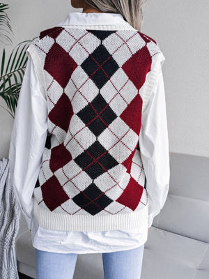 Argyle knit sweater vest in burgundy, black, and white acrylic with a V-neck.