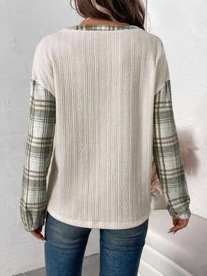 Cream textured henley top with plaid raglan sleeves