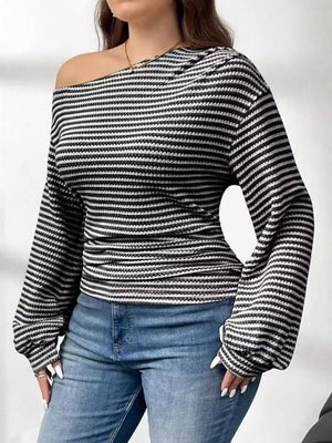 Black and white striped one-shoulder maternity t-shirt with long balloon sleeves.
