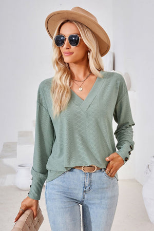 Sage green textured V-neck blouse with button cuff long sleeves