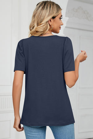Dark blue tee with square neck and sculpted short sleeves.