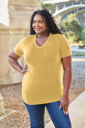 Yellow V-neck pocket tee with short sleeves and a relaxed fit.