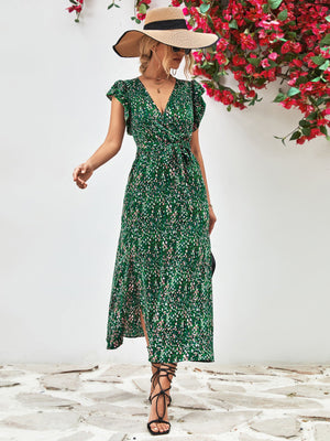 Green floral wrap midi dress with flutter sleeves and belted waist
