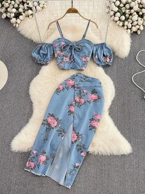 Denim sweetheart cami with puff sleeves and floral print skirt with thigh slit