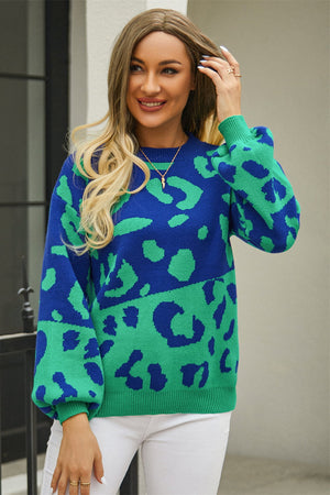 Colorblock leopard knit sweater with balloon sleeves in blue and green acrylic.