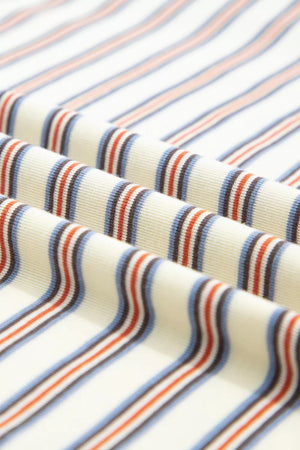 Cotton striped mini dress with blue, orange, and brown stripes on a cream background.