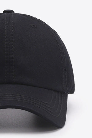 Black canvas baseball cap with stitched details and curved brim.