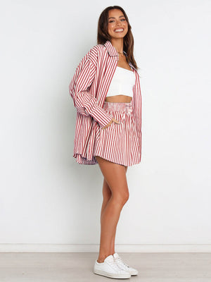 Oversized red and white stripe shirting set with button-up shirt and drawstring shorts.