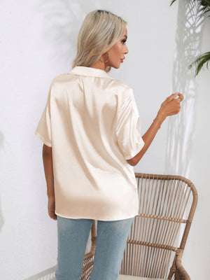Champagne satin collared shirt with short sleeves, shown from the back.