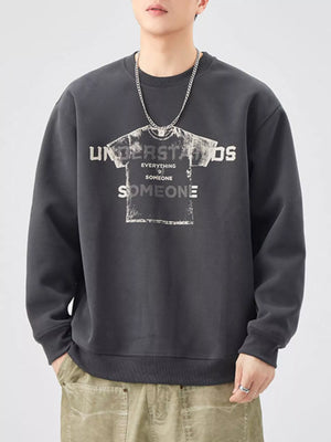 Men's dark gray oversized graphic sweatshirt with crewneck and long sleeves.