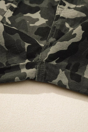 Camo print jeans with detailed stitching and a cotton fabric.