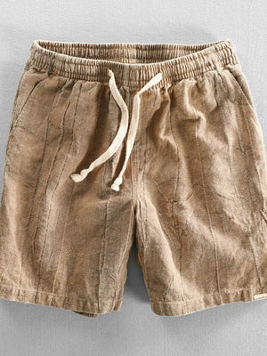 Camel relaxed fit drawstring men's shorts with vertical texture and elastic waistband.
