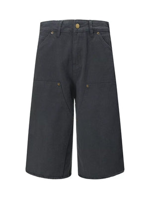 Dark gray relaxed fit utility capris for men with multiple pockets and brass button closure.