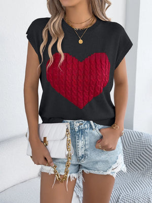 Black cable knit sweater vest with a red cable knit heart graphic.