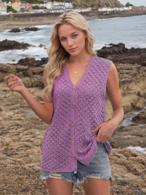 Lilac openwork button-down knit vest with a V-neck and wooden buttons.