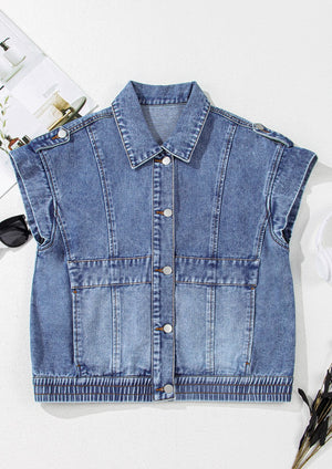 Boxy medium wash denim vest with button front, chest pockets, and shoulder detail.