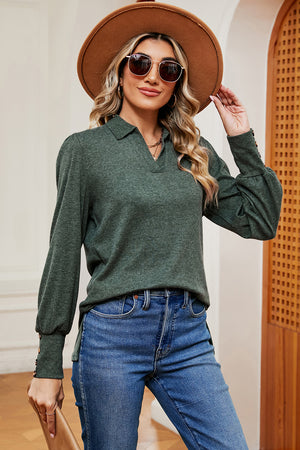 Dark green buttoned blouse with collared neckline and lantern sleeves