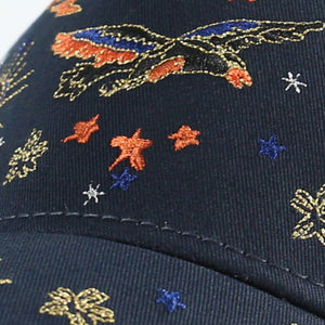 Navy blue cotton baseball cap with intricate embroidered eagle and star pattern.