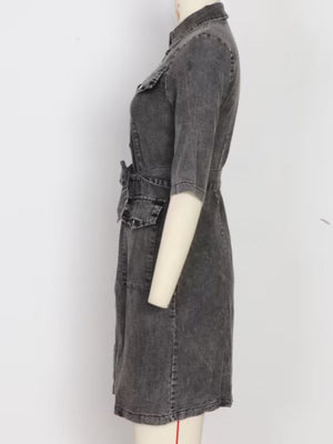 Grey denim shirt dress with zipper front, belt, and pockets.