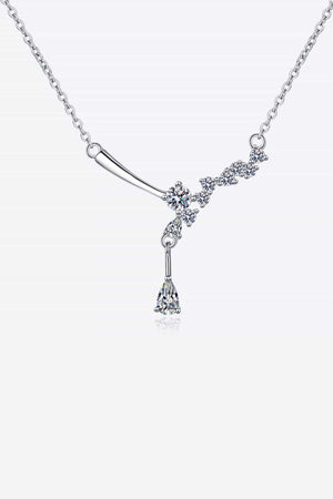 Silver asymmetrical pendant necklace with moissanite cluster and pear-shaped drop.